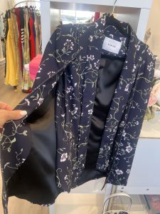 Cape jacket on hanger in a store